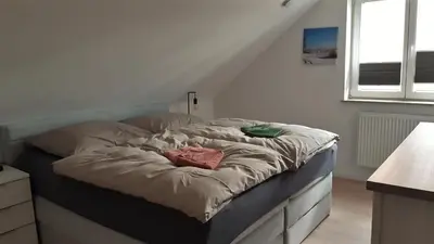 Ein Bett oder Betten in einem Zimmer der Unterkunft Ferienhaus Papstdorf