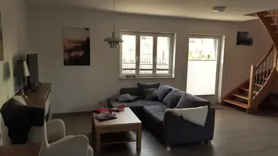 Ein Sitzbereich in der Unterkunft Ferienhaus Papstdorf