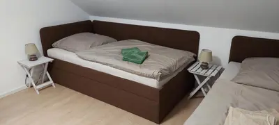 Ein Bett oder Betten in einem Zimmer der Unterkunft Ferienhaus Papstdorf