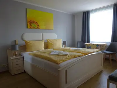 Ein Bett oder Betten in einem Zimmer der Unterkunft Pension Sigwarth