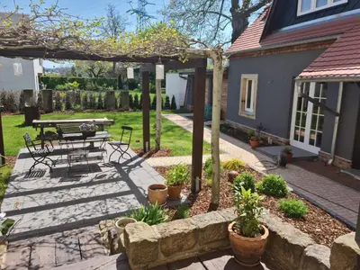 Ein Garten an der Unterkunft Ferienhaus an der Plantage