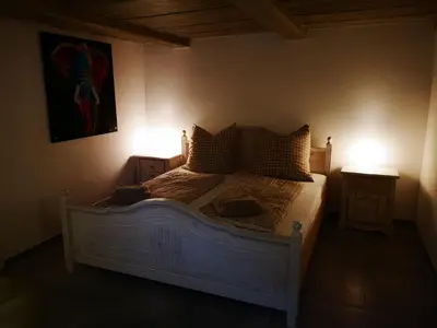 Ein Bett oder Betten in einem Zimmer der Unterkunft Ferienhaus Elbsicht