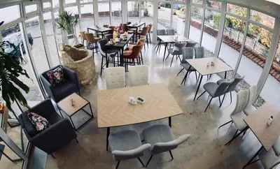 Ein Restaurant oder anderes Speiselokal in der Unterkunft Parkhotel am Schloss Machern