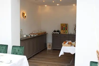 Ein Restaurant oder anderes Speiselokal in der Unterkunft Spreezeit Hotel connect