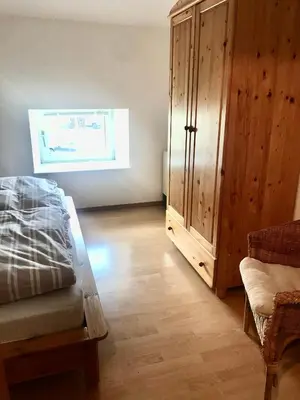 Ein Bett oder Betten in einem Zimmer der Unterkunft Ferienwohnung Zweinig02