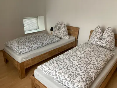 Ein Bett oder Betten in einem Zimmer der Unterkunft Ferienwohnung Zweinig02