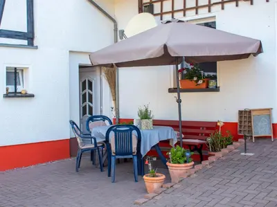 Ein Patio oder anderer Außenbereich in der Unterkunft Ferienwohnung am Kugelbaum