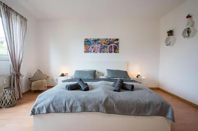 Ein Bett oder Betten in einem Zimmer der Unterkunft Große Louise in der Neustadt für Familien & Kinder
