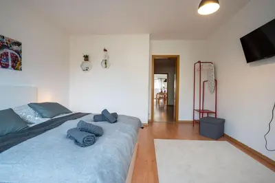 Ein Bett oder Betten in einem Zimmer der Unterkunft Große Louise in der Neustadt für Familien & Kinder