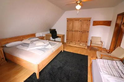 Ein Bett oder Betten in einem Zimmer der Unterkunft Ferienwohnung am Barockgarten