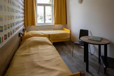 Ein Bett oder Betten in einem Zimmer der Unterkunft Gästehaus Dresden - Alte Schule Gohlis