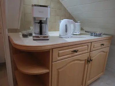 Küche/Küchenzeile in der Unterkunft Penthouse Wolkenstein großzügige Maisonette auf 155 qm mit Whirlpool, Klima & Kamin