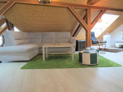 Ein Sitzbereich in der Unterkunft Penthouse Wolkenstein großzügige Maisonette auf 155 qm mit Whirlpool, Klima & Kamin