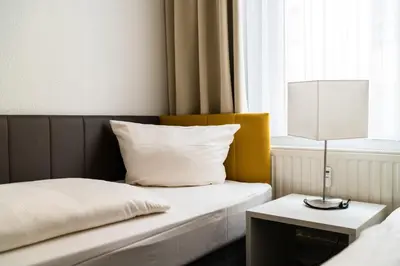 Ein Bett oder Betten in einem Zimmer der Unterkunft Familienapartment nahe der Frauenkirche