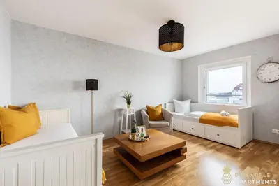 Ein Sitzbereich in der Unterkunft PINEAPPLE APARTMENTS - Zwinger V - 78qm - 1x free parking