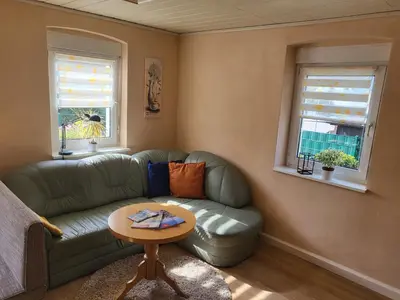 Ein Sitzbereich in der Unterkunft Ferienwohnung Simmert