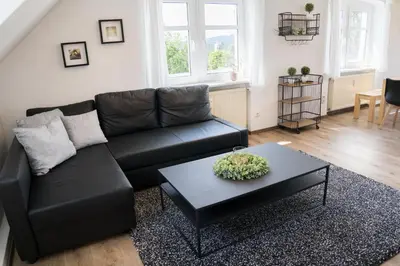 Ein Sitzbereich in der Unterkunft Urlaubsfreude Biedermann Haus Glücksstein - Mondstein