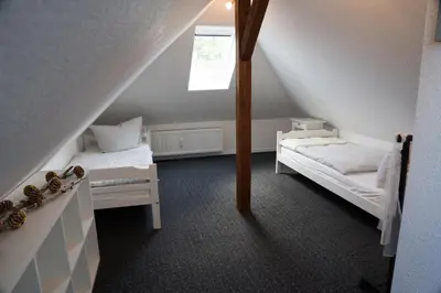 Ein Bett oder Betten in einem Zimmer der Unterkunft Urlaubsfreude Biedermann Haus Glücksstein - Mondstein