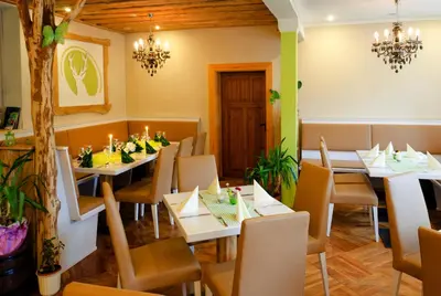 Ein Restaurant oder anderes Speiselokal in der Unterkunft Apartmenthaus Reichelt