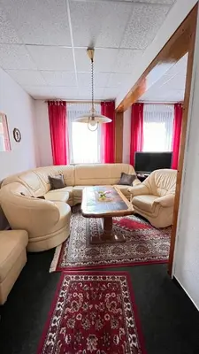 Ein Sitzbereich in der Unterkunft Ferienwohnung NEUMANN a.d. Porzellan-Manufaktur