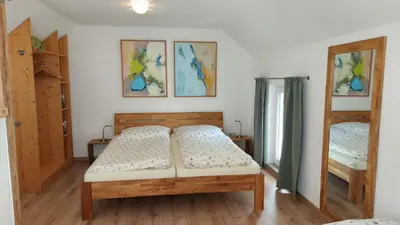 Ein Bett oder Betten in einem Zimmer der Unterkunft Ferienhaus Richtermühle