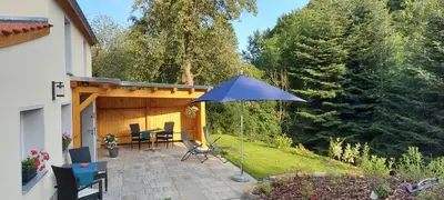 Ein Garten an der Unterkunft Ferienhaus Richtermühle