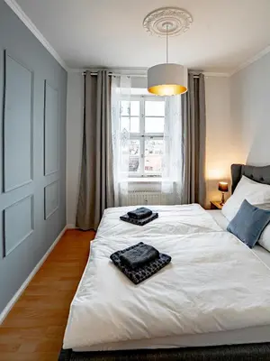 Ein Bett oder Betten in einem Zimmer der Unterkunft Altstadtjuwel