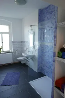 Ein Badezimmer in der Unterkunft Ferienwohnung ANDERE ZEITEN