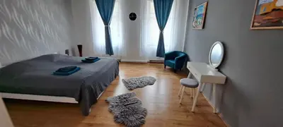 Ein Bett oder Betten in einem Zimmer der Unterkunft Apartments Badallee 4