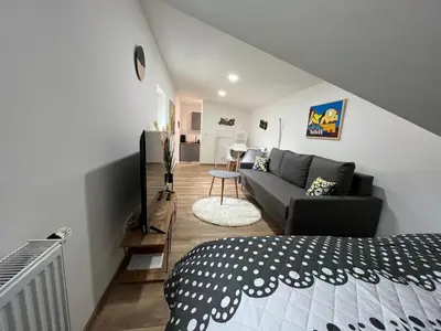 Ein Sitzbereich in der Unterkunft Apartments Badallee 4