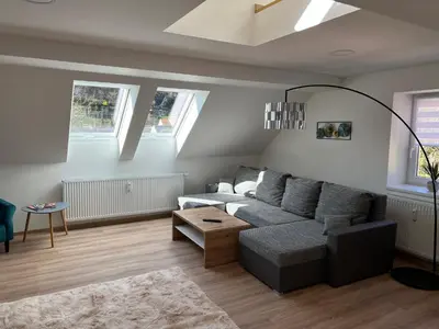Ein Sitzbereich in der Unterkunft Apartments Badallee 4