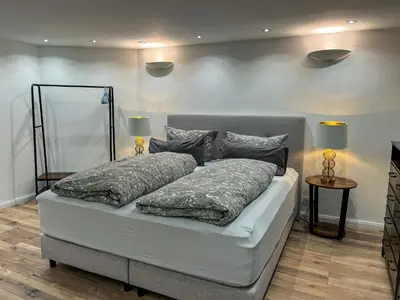 Ein Bett oder Betten in einem Zimmer der Unterkunft Wohnperle Apartment Alexa