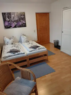 Ein Bett oder Betten in einem Zimmer der Unterkunft Einkehr zur Rennstrecke