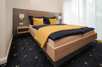 Ein Bett oder Betten in einem Zimmer der Unterkunft Gästehaus Weinberge