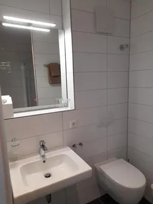 Ein Badezimmer in der Unterkunft Gästehaus Weinberge