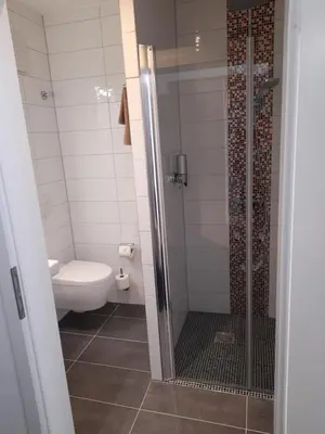 Ein Badezimmer in der Unterkunft Gästehaus Weinberge