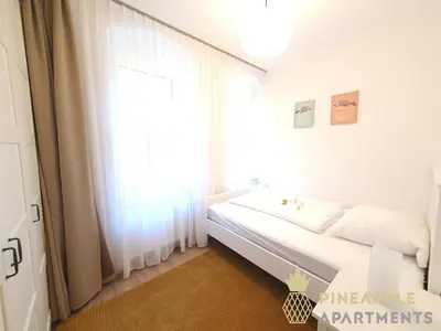 Ein Bett oder Betten in einem Zimmer der Unterkunft Ruhiges Hinterhof Apartment im Herzen der Neustadt