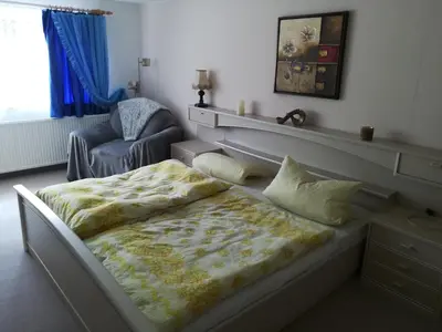 Ein Bett oder Betten in einem Zimmer der Unterkunft schnuggliche Ferienwohnung