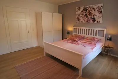 Ein Bett oder Betten in einem Zimmer der Unterkunft Ferienwohnung zum Bielatal