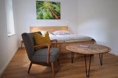 Ein Bett oder Betten in einem Zimmer der Unterkunft Ferienwohnung zum Bielatal