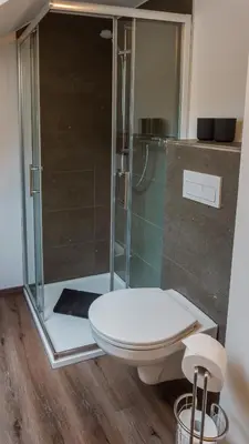 Ein Badezimmer in der Unterkunft Appartementhaus- Bredner / Appartement IV