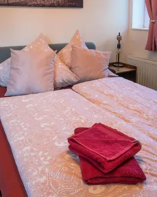 Ein Bett oder Betten in einem Zimmer der Unterkunft Appartementhaus- Bredner / Appartement II