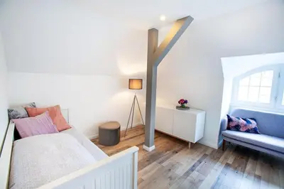 Ein Bett oder Betten in einem Zimmer der Unterkunft Wohnperle Apartment Adele