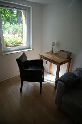Ein Sitzbereich in der Unterkunft Ferienwohnung Lorbeer