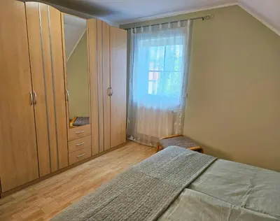 Ein Bett oder Betten in einem Zimmer der Unterkunft Ferienhaus Villa Maria - Ferienwohnung Chippendale
