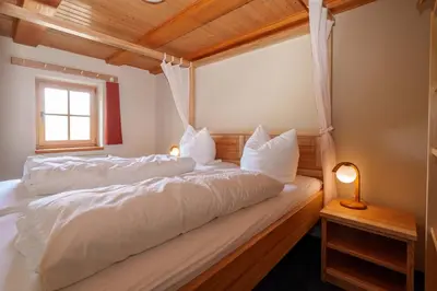 Ein Bett oder Betten in einem Zimmer der Unterkunft Ferienwohnung Spielzeughof