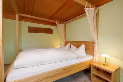 Ein Bett oder Betten in einem Zimmer der Unterkunft Ferienwohnung Spielzeughof