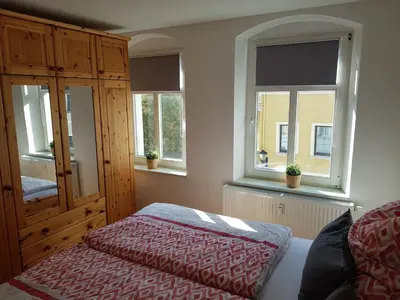 Ein Bett oder Betten in einem Zimmer der Unterkunft Ferienwohnung in Kamenz