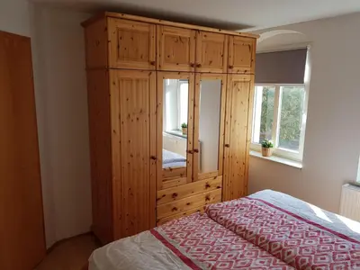 Ein Bett oder Betten in einem Zimmer der Unterkunft Ferienwohnung in Kamenz
