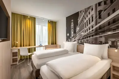 Ein Bett oder Betten in einem Zimmer der Unterkunft Super 8 by Wyndham Chemnitz